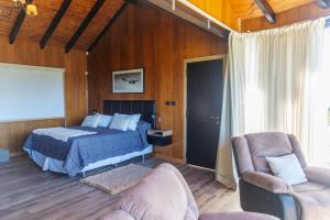 Postel nebo postele na pokoji v ubytování Catalina - Casa de Montaña