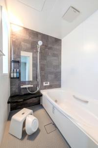 En eller flere senge i et værelse på Villa RIKUNOYA SUZUKA