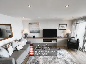 TV a/nebo společenská místnost v ubytování 25 Breakwaters - Pet friendly
