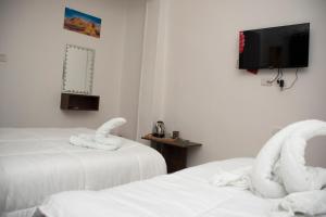Letto o letti in una camera di Keeper Pyramids View INN