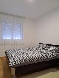 Postel nebo postele na pokoji v ubytování Gruda 086