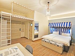 Postel nebo postele na pokoji v ubytování Wangerland Resort + 20 fotografií
