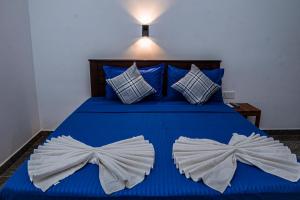 Rúm í herbergi á Theevanni Resort