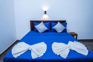 Rúm í herbergi á Theevanni Resort