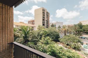 a balcony with a view of a city at Pio XII Apartments Valencia in Valencia