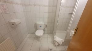 Koupelna v ubytování Hotel Baross