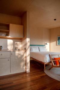 Postel nebo postele na pokoji v ubytování Wood Mood Lodges