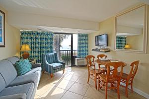TV o dispositivi per l'intrattenimento presso Peppertree By The Sea