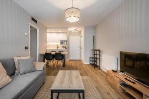 A television and/or entertainment centre at Teso dera Mina by Totiaran