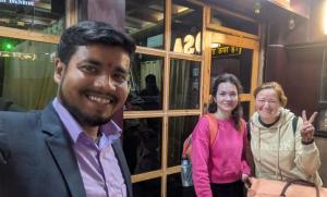 a group of people standing in front of a building at Hotel Ganpati in Patna