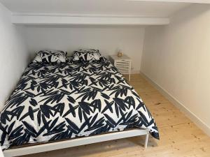 Postel nebo postele na pokoji v ubytování T3 duplex vue mer