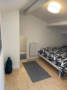 Postel nebo postele na pokoji v ubytování T3 duplex vue mer