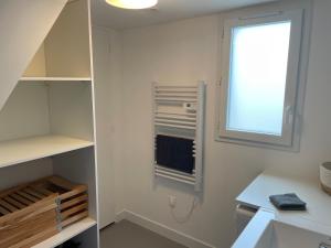 TV a/nebo společenská místnost v ubytování T3 duplex vue mer
