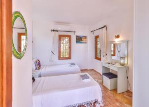 Giường trong phòng chung tại Lebi Derya +16 ảnh