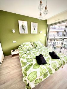 Ένα ή περισσότερα κρεβάτια σε δωμάτιο στο Sphinx de Thau