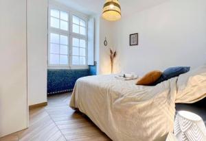 Postel nebo postele na pokoji v ubytování Appartement Cosy Rennes Centre Historique - 4 personnes