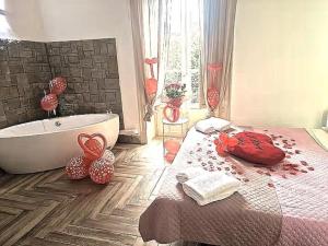 Posteľ alebo postele v izbe v ubytovaní Calypso Il Binario Elegance