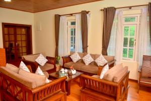 A seating area at Tea Queens Bungalow Még 77 kép