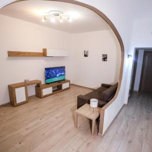 Televisyen dan/atau pusat hiburan di Casa Mia Apartment Fiumicino