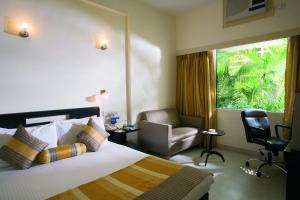Voodi või voodid majutusasutuse Lemon Tree Hotel, Udyog Vihar, Gurugram toas