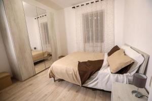 Katil atau katil-katil dalam bilik di Casa Mia Apartment Fiumicino