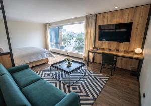 TV a/nebo společenská místnost v ubytování BTH Hotel Lima Golf