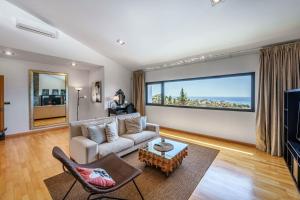 A television and/or entertainment centre at Villa Holivista