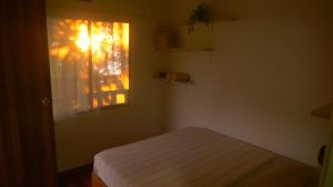 Postel nebo postele na pokoji v ubytování Casa Oh - Oceanview Guesthouse
