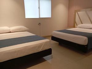 Postel nebo postele na pokoji v ubytování Hotel Med 33