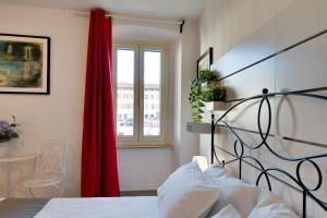 Letto o letti in una camera di Erikasa - soggiorna in centro a Cormons