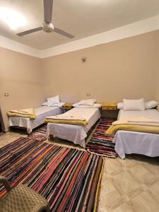 A bed or beds in a room at انير انشال Enir Enshal