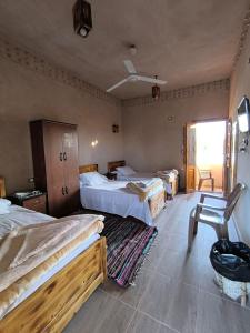 A bed or beds in a room at انير انشال Enir Enshal