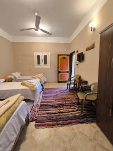 A bed or beds in a room at انير انشال Enir Enshal