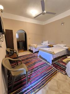 A bed or beds in a room at انير انشال Enir Enshal