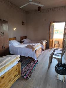 A bed or beds in a room at انير انشال Enir Enshal