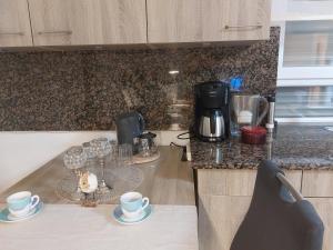 Příslušenství pro přípravu čaje a kávy v ubytování Erdgeschosswohnung