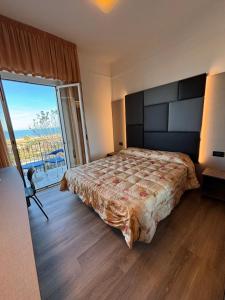 Postel nebo postele na pokoji v ubytování Hotel Cobalto