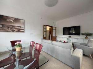 TV a/nebo společenská místnost v ubytování Apartamento Parque Romano