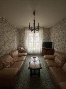 Posezení v ubytování Chez Papy et Mamie