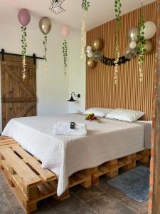 Postel nebo postele na pokoji v ubytování Casa Rural Villa Milú