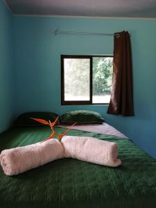 Ένα ή περισσότερα κρεβάτια σε δωμάτιο στο Paz y Flora Cabins - 4x4 or 4x2 Car Only