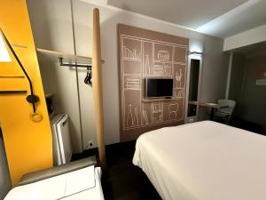 Postel nebo postele na pokoji v ubytování ibis Sao Paulo Ibirapuera