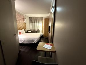 Postel nebo postele na pokoji v ubytování ibis Sao Paulo Ibirapuera