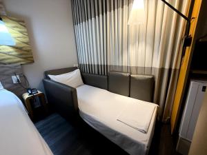 Postel nebo postele na pokoji v ubytování ibis Sao Paulo Ibirapuera