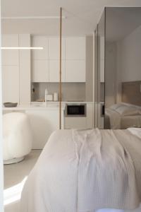 Postel nebo postele na pokoji v ubytování Urban mirage