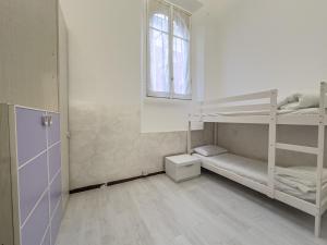 Postel nebo postele na pokoji v ubytování NAVIGLI Urban Retreat + 8 fotografií