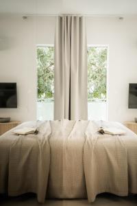 Postel nebo postele na pokoji v ubytování Urban mirage