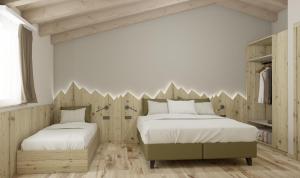 Postel nebo postele na pokoji v ubytování Camping Val di Sole