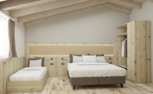 Posteľ alebo postele v izbe v ubytovaní Camping Val di Sole