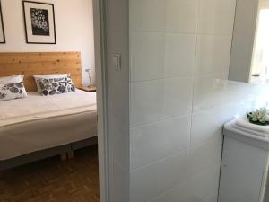 Postel nebo postele na pokoji v ubytování Gabi Villa